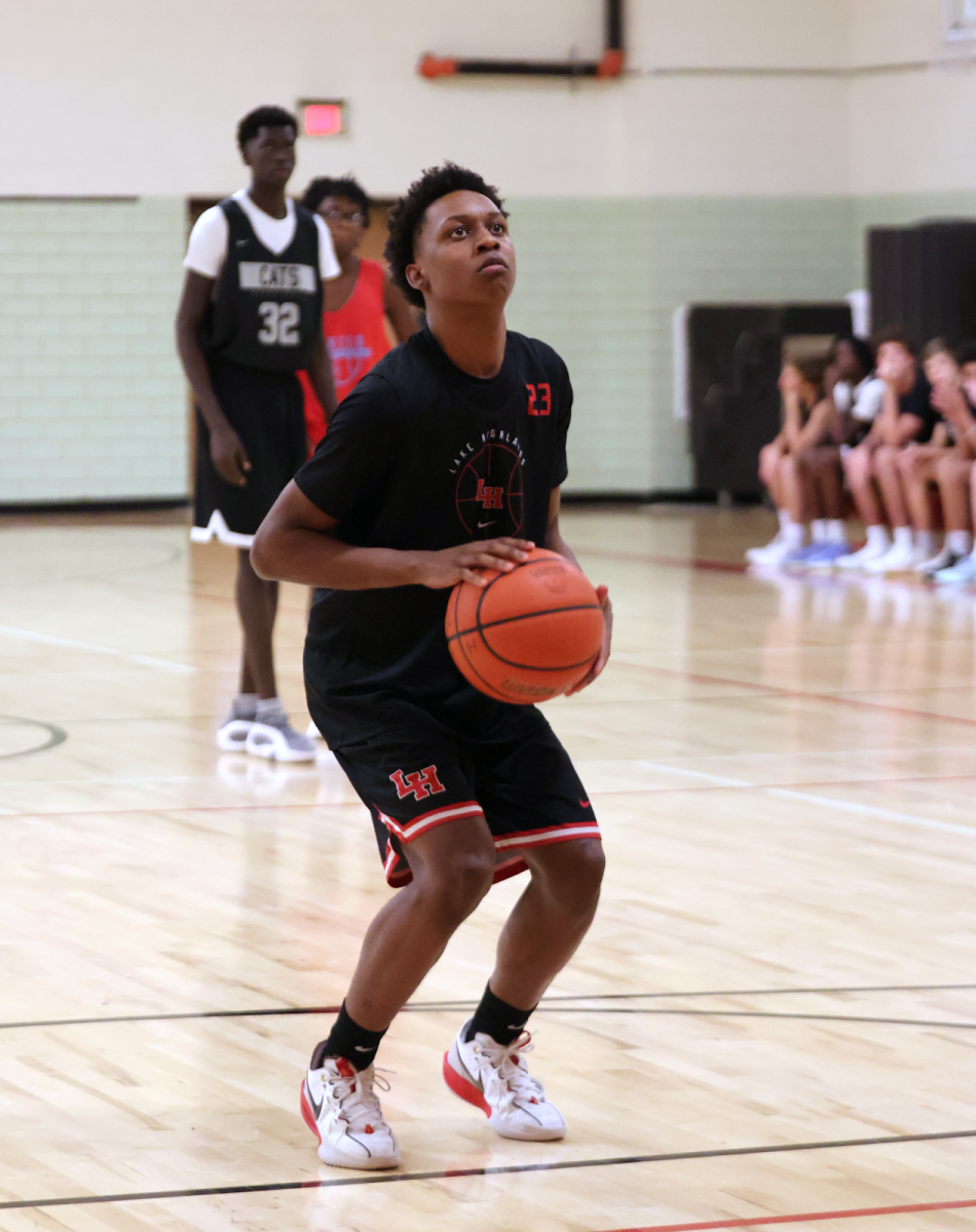 Kevin Turner (11) prepares to shoot his second free throw after being fouled by a Carter Cowboy.